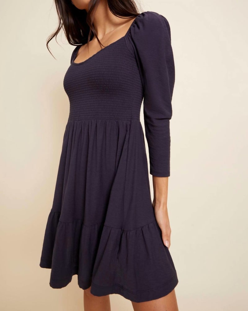 Front of a model wearing a size L Noel Babydoll Dress In Navy in Navy by Nation LTD. | dia_product_style_image_id:342419